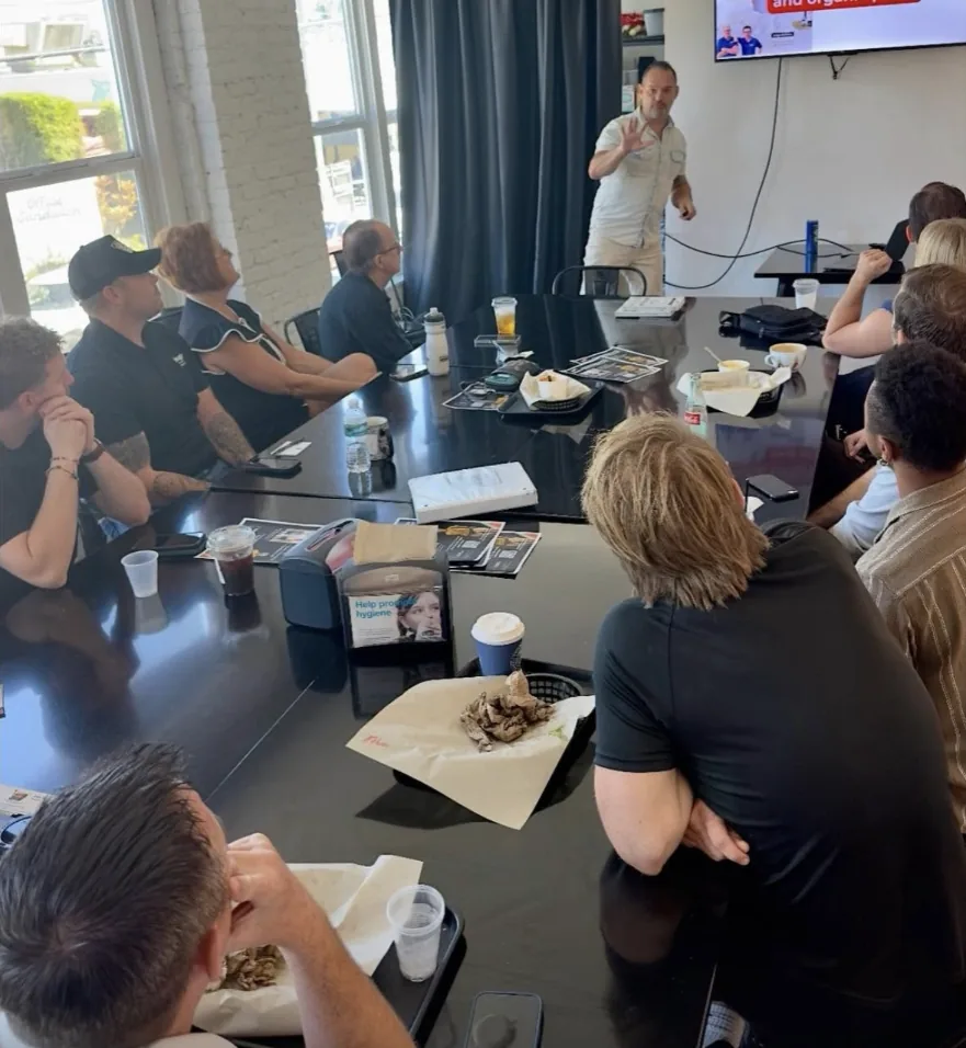 Brian Orr presenting at a lunch and learn for a business group.