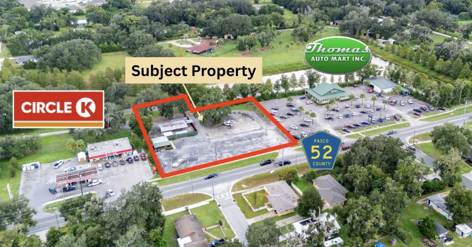 Aerial view of 13815 21st Street in Dade City, outlined, next to a Circle K on County Road 52.