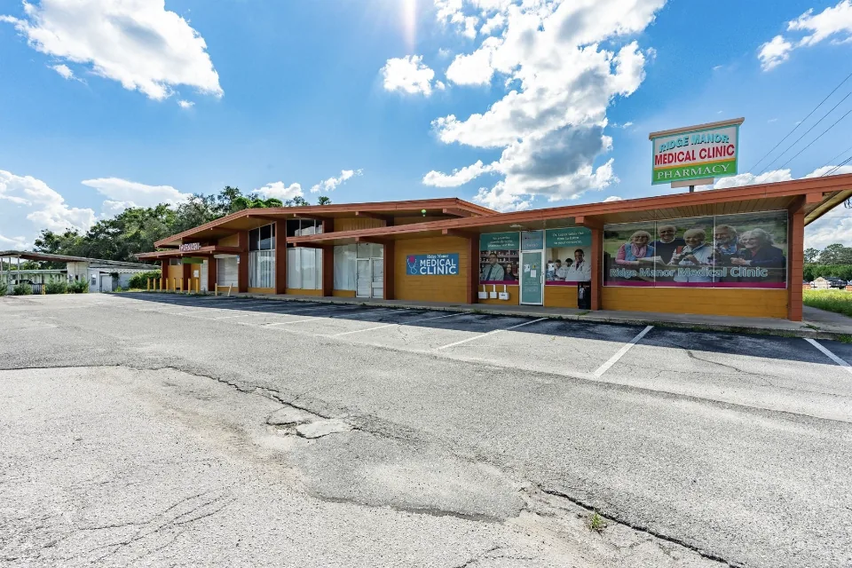 34498 Cortez Boulevard, a freestanding professional building with paved parking in Ridge Manor, Florida.